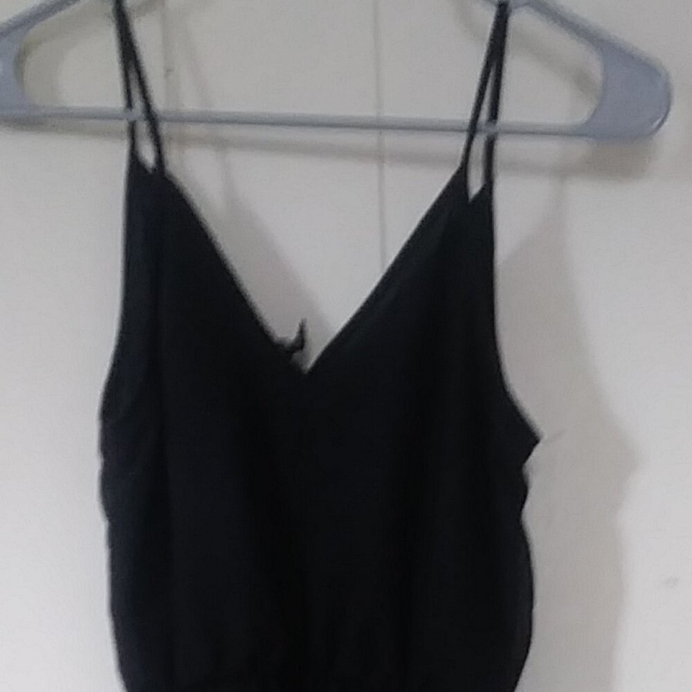 Divided Long Black Sleeveless Dress with half slip underneath.